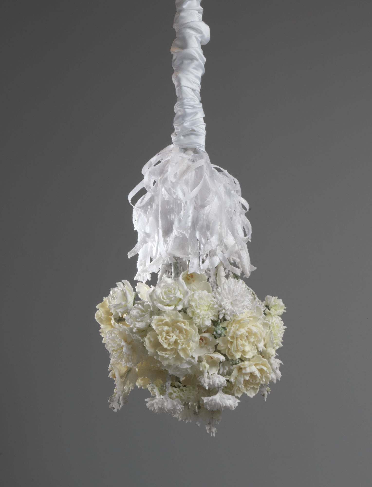 Petah Coyne Untitled #1419 (Bruno Schulz: The Street of Crocodiles), 2016 Specially-formulated wax, pigment, silk flowers, ribbons, steel, steel rods, wire, tape, epoxy, 3/8" Grade 30 proof coil chain, quick-link shackles, jaw-to-jaw swivel, silk Duchesse satin, Velcro, thread, paper towels, plastic 39 x 20 x 20 inches (99.1 x 50.8 x 50.8 cm)