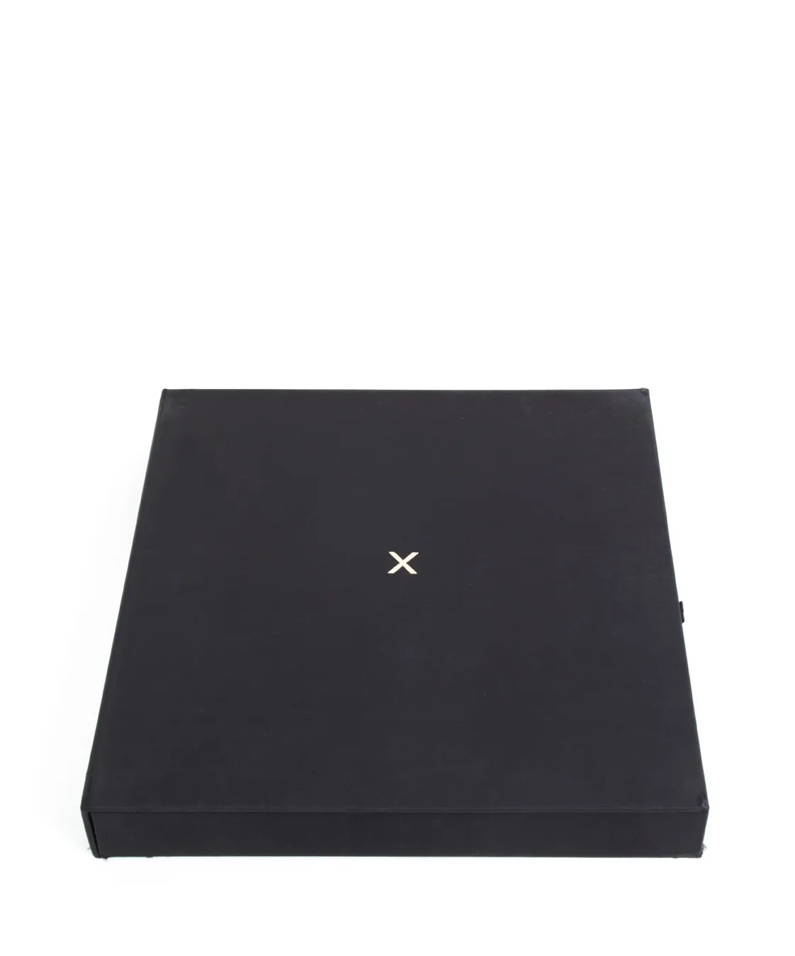 X Portfolio, 1978 Black clamshell case with 13 gelatin silver prints ©Robert Mapplethorpe Foundation. Used by permission.