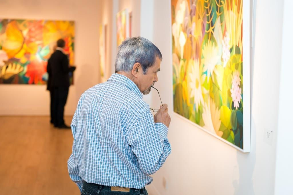 Shanti Panchal admiring a painting