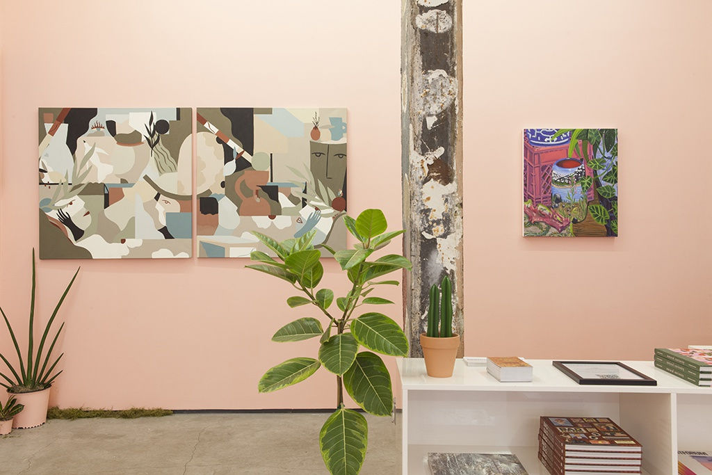 installation view of Lush 2022, gallery with peach walls and floral / plant themed artwork