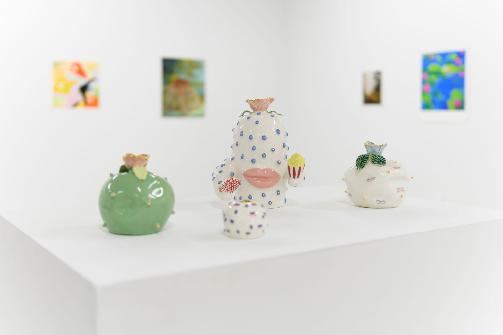 Installation photo from Multiples. Sculptures from left to right, Jen Dwyer - "Emmaline", "Coco", "Vanessa", "Harriet". Prints from left to right, Lorien Stern - "Old Friends", Rachel Gregor - "On the Dock", Angela Burson - "The Valley", Megan Ellen MacDo