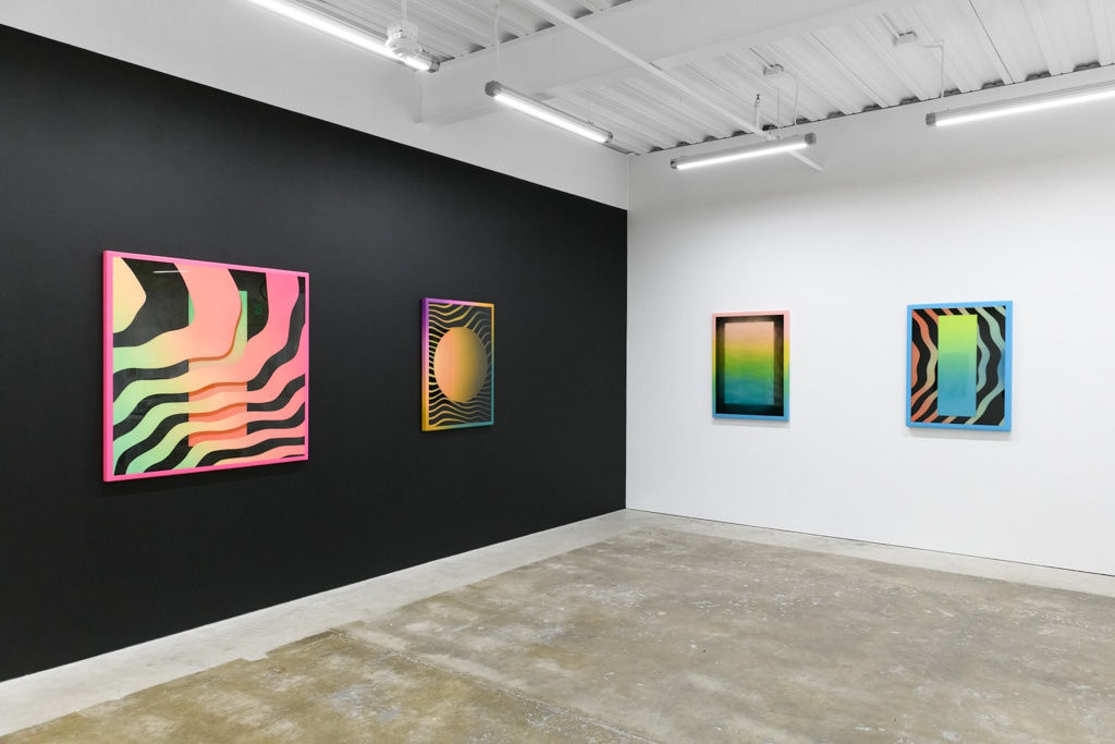 Install image of "Cosmic Bloom." From left to right, "WAVEFORMPORTAL," "BLACKHOLEGLOW," "PORTALIZED," "ULTRASONICWAVEPOOL."