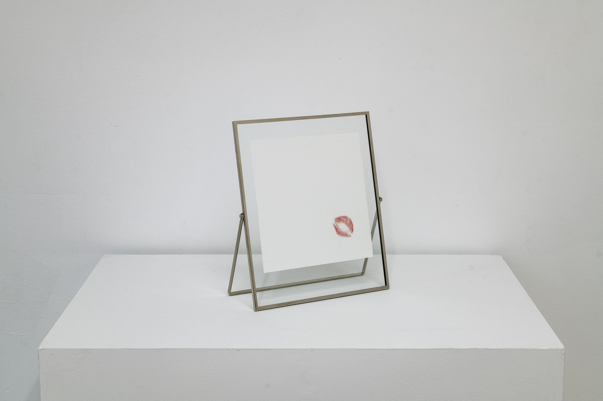 Martine Gutierrez Kiss, 2025 Cotton tissue, glass, aluminum, Rouge Dior lipstick 10 x 8 inches 25 x 20 cm