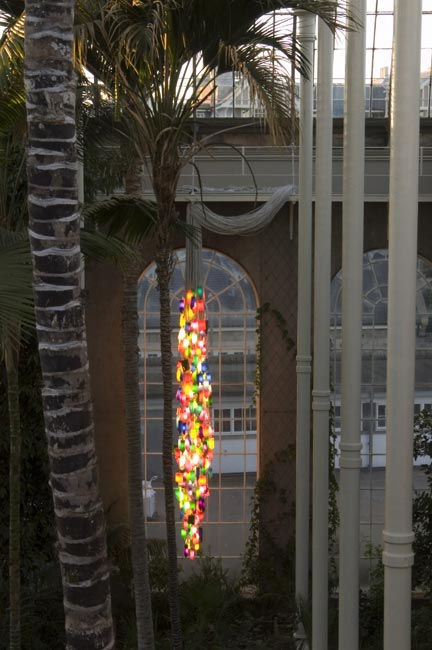 Candela 7/450 (For the Death Star) 2006 450 household bottles, low energy lamps, cable. Installed at the Victorian Palmhouse, Royal Botanic Gardens Edinburgh during the Edinburgh Art Festival in August 2006. image courtesy Ruth Clark
