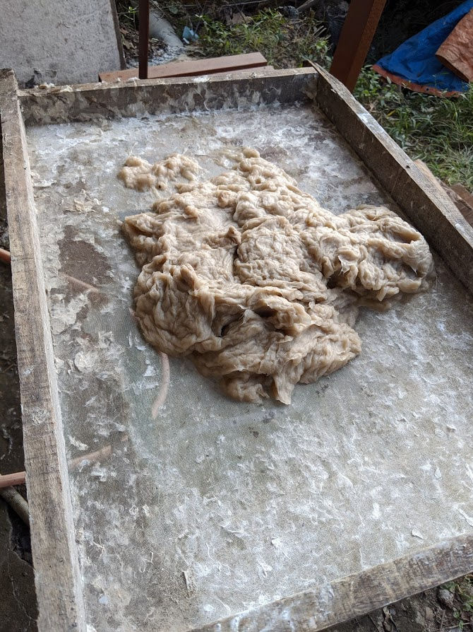 Wet lokta pulp before being spread out onto a screen, 2019