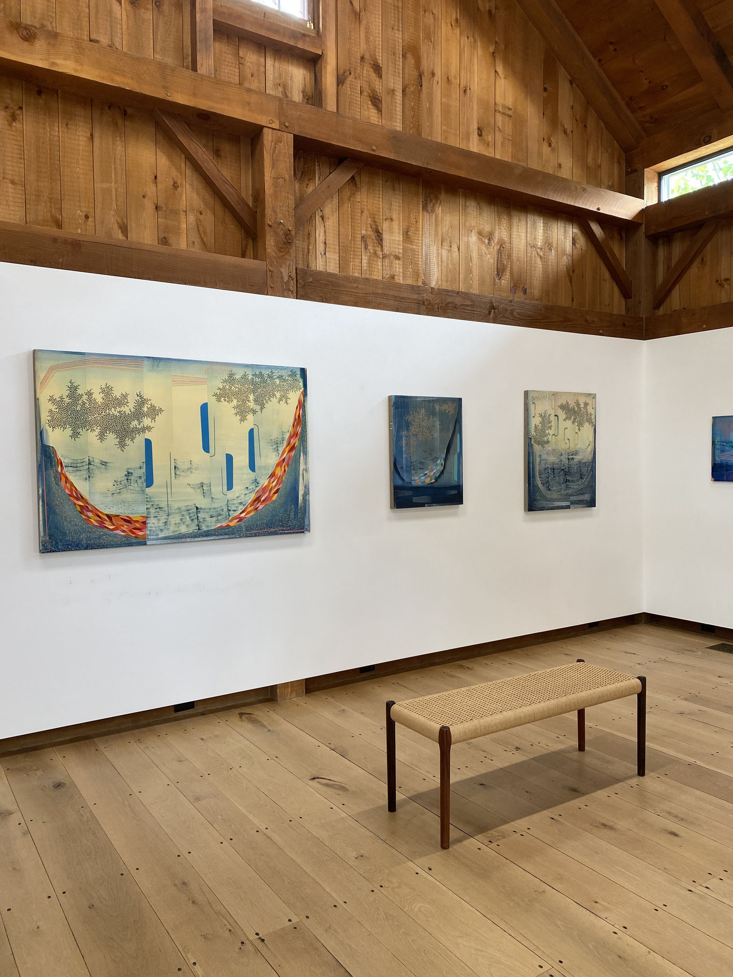 Installation view with paintings by Gabe Brown