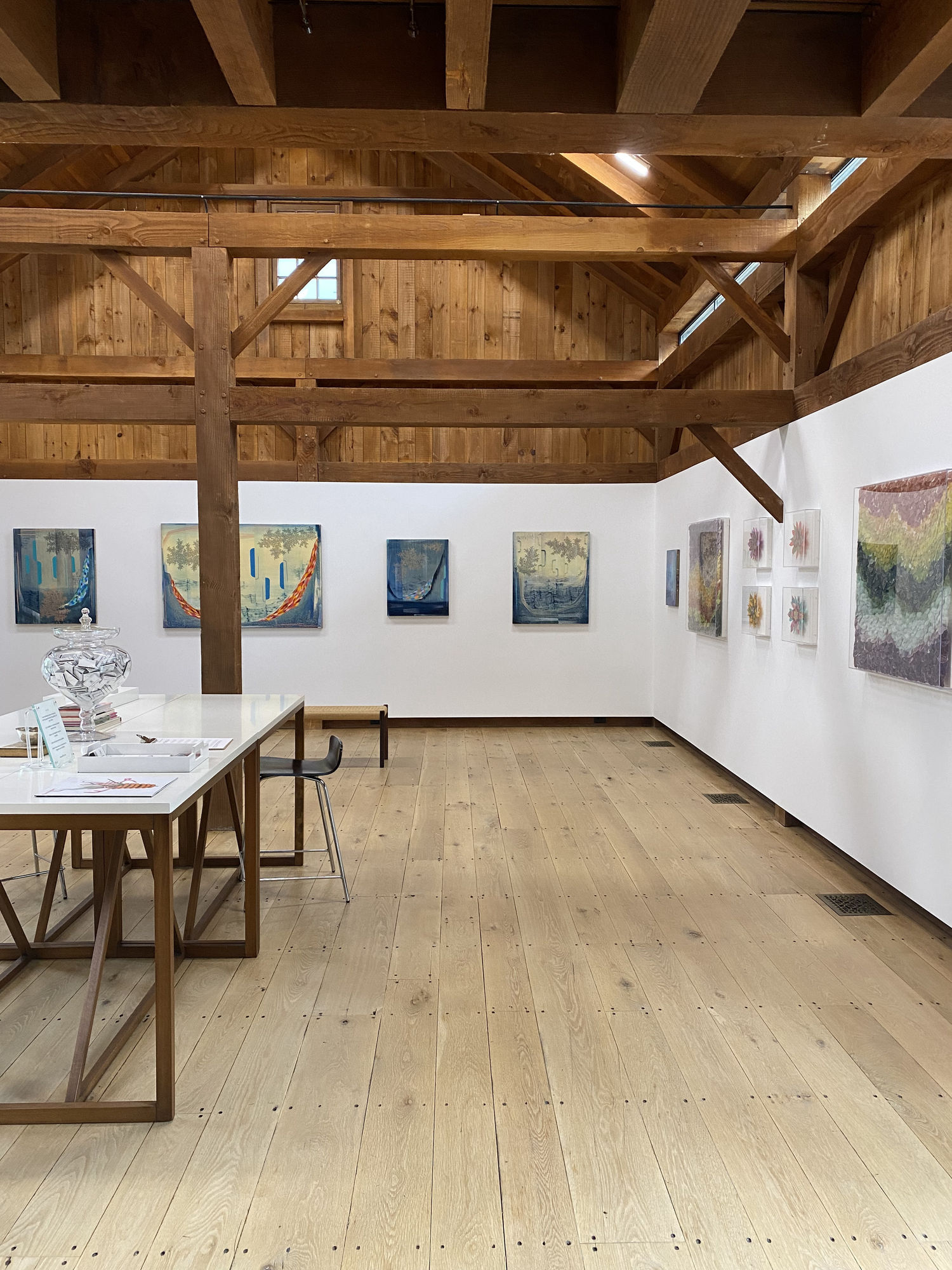 Installation view with paintings by Gabe Brown and pinned paper works by Jill Parisi