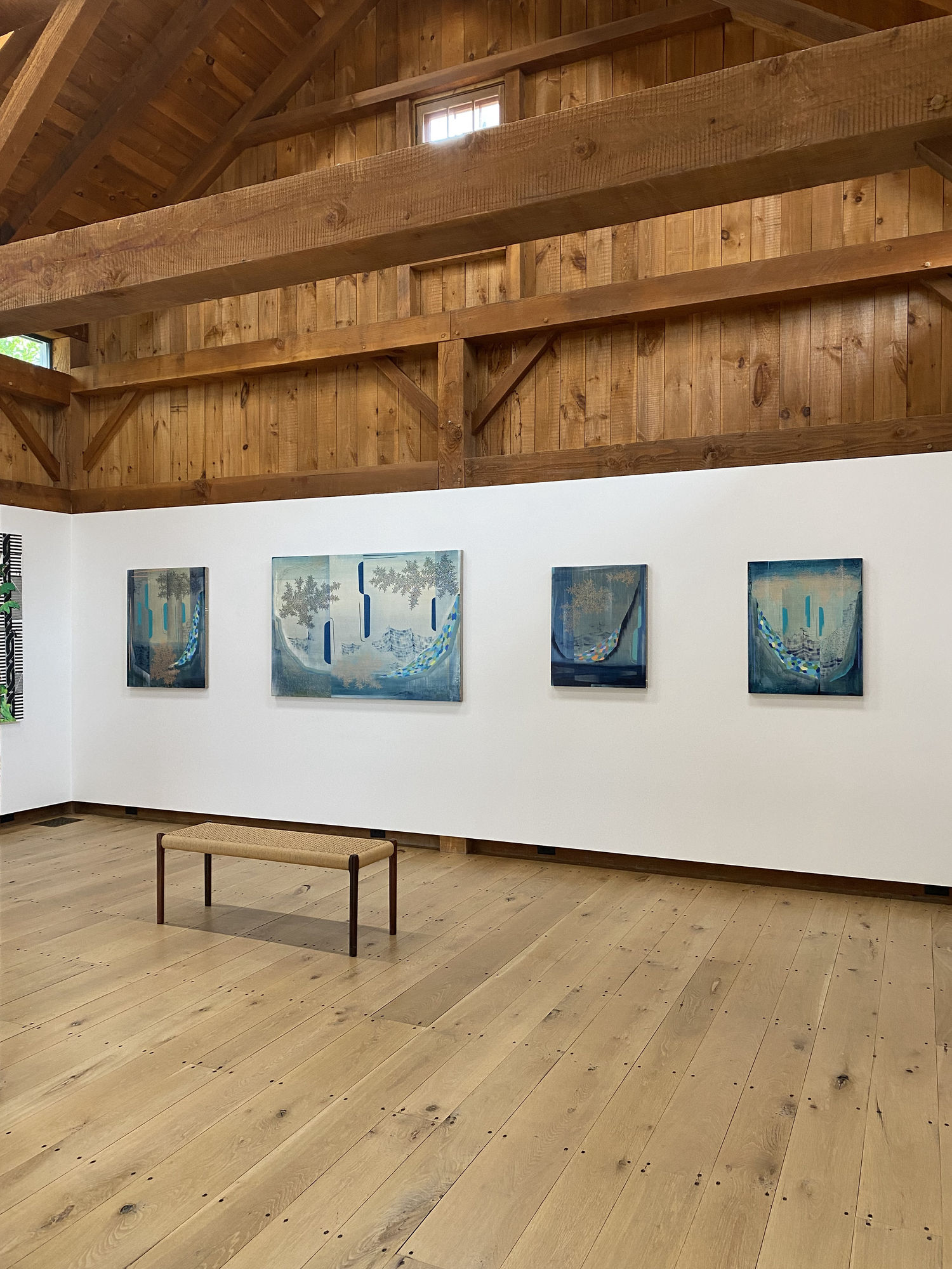 Installation view with paintings by Gabe Brown