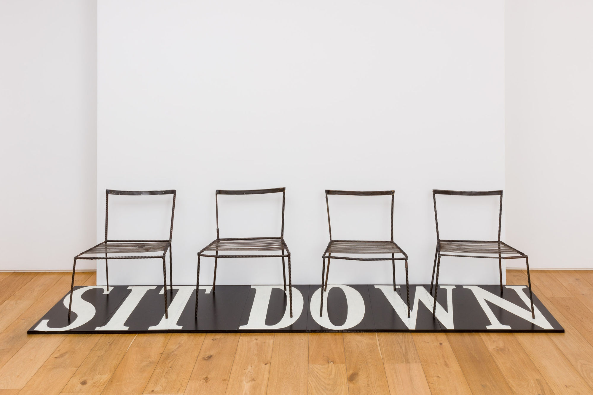Franz West Untitled (Sit Down), 1996 – 2003 4 metal chairs, wooden board and lacquer (8 parts)