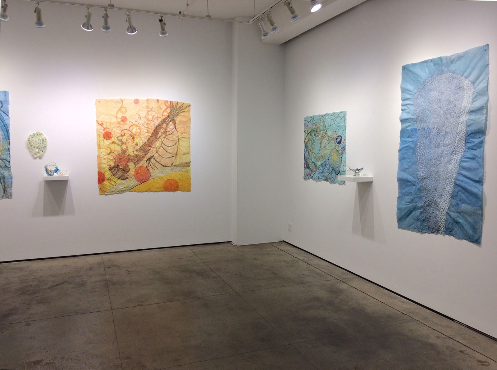 Installation shot of several different works by Nancy Cohen. 