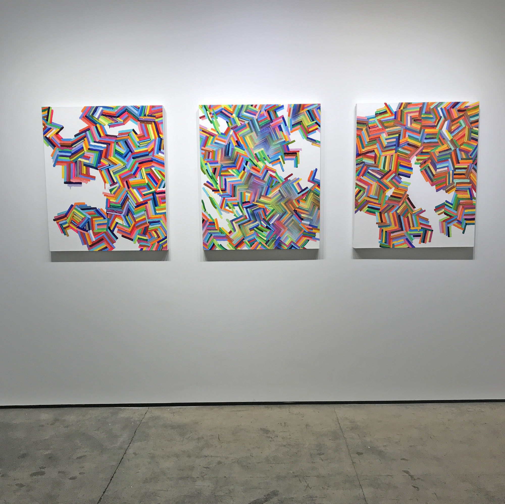 Installation shot of three acrylic paintings by Martina Nehrling. From left to right, the paintings are "June 6 Saturday", "April 1919" and "A Monday in February".