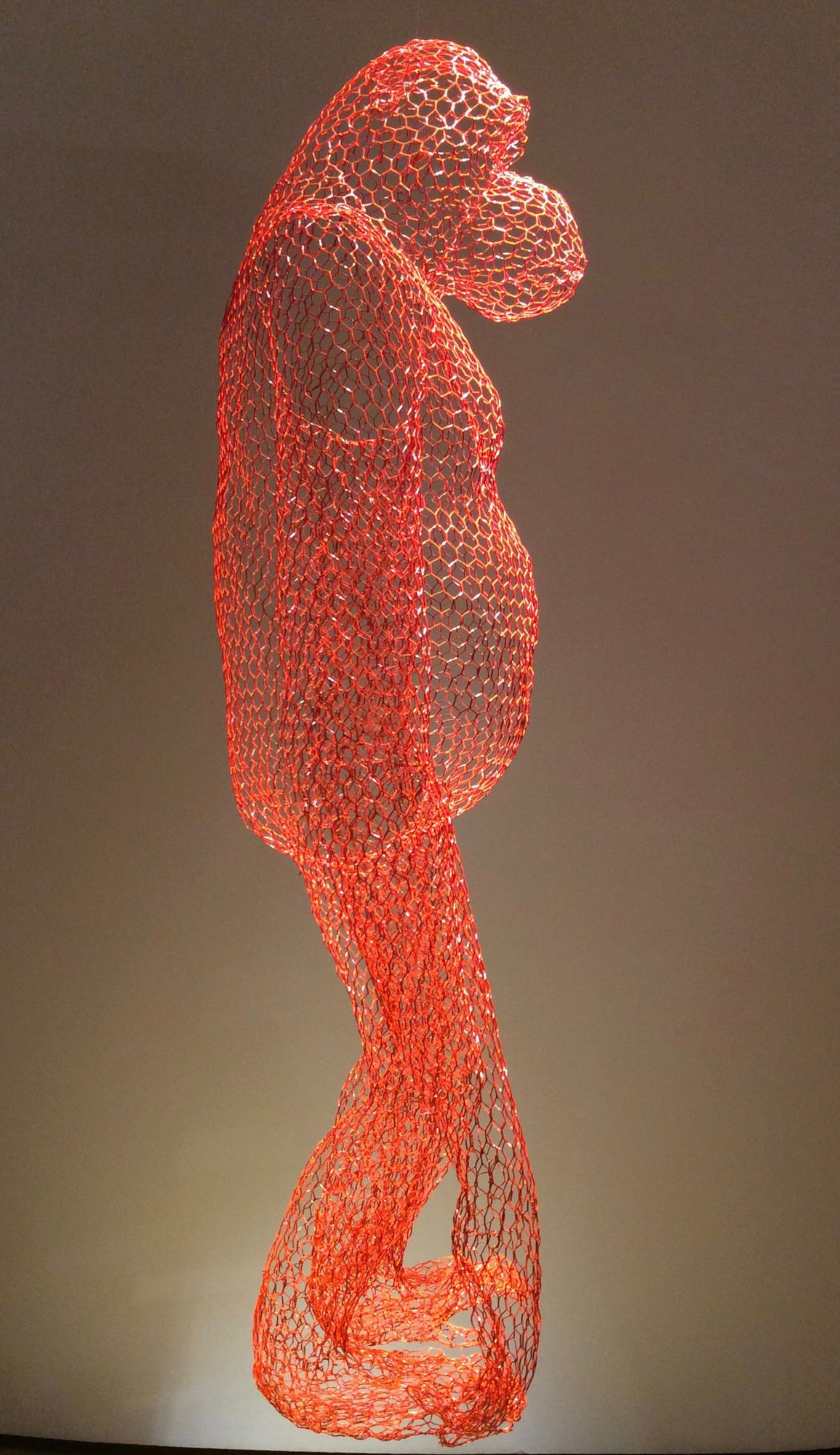 Orangutan, 2017 Hand-formed sculpture in wire, painted finish in deep orange