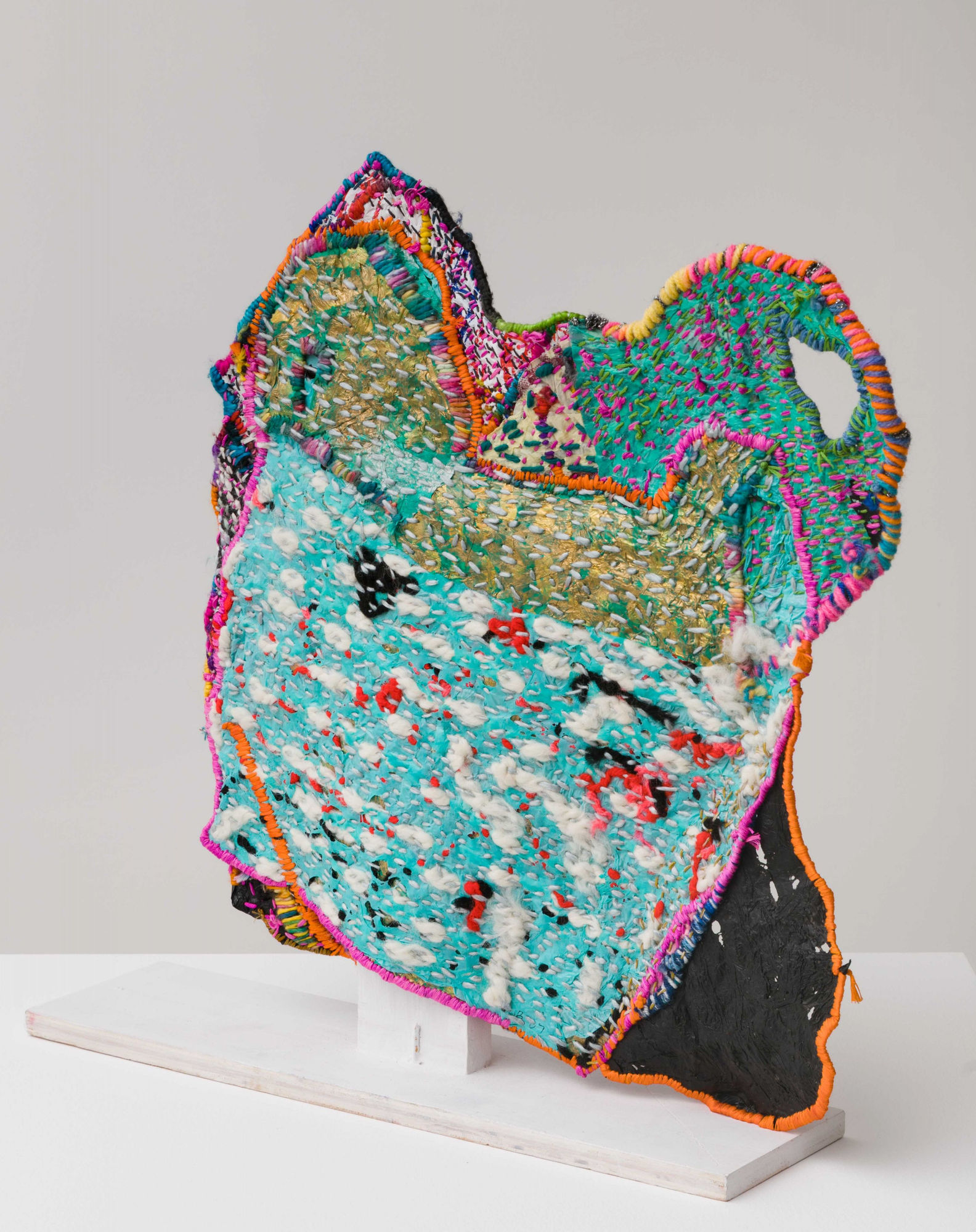 Josh Blackwell Neveruses (Unprincipled) 2014 Plastic, wool, silk, paint, paper 15.5 x 15 x 4 inches (39.4 x 38.1 x 10.2 cm) JBl 12