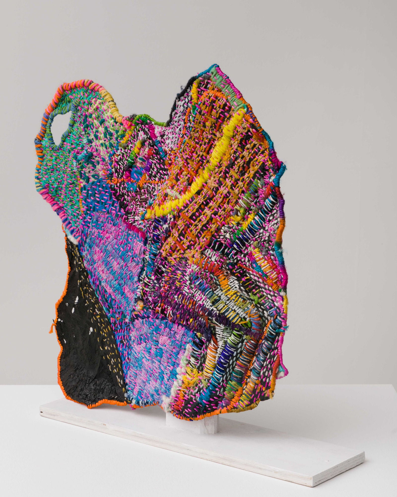 Josh Blackwell Neveruses (Unprincipled), (alternate view) 2014 Plastic, wool, silk, paint, paper 15.5 x 15 x 4 inches (39.4 x 38.1 x 10.2 cm) JBl 12