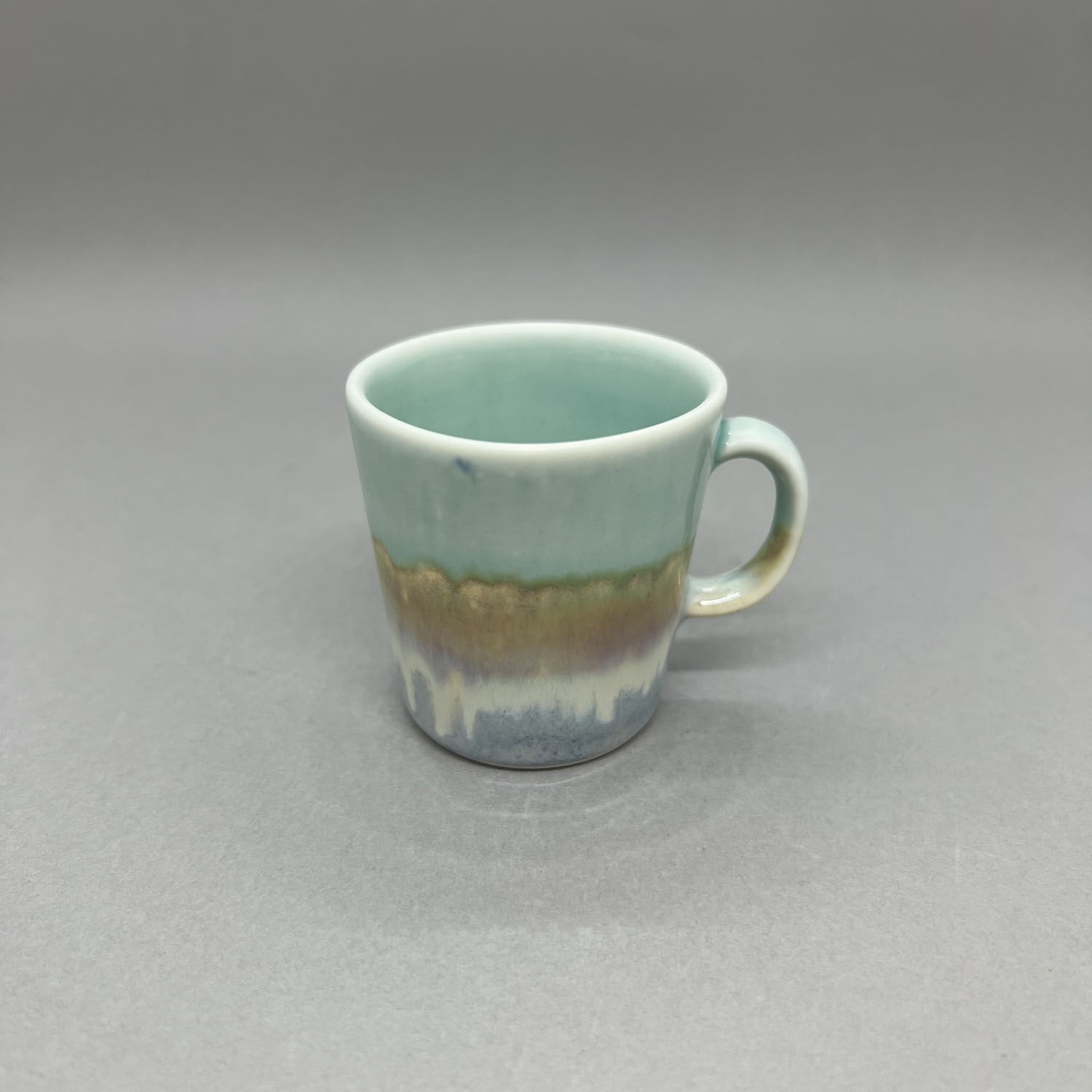 Yuta Segawa espresso cup in a speckled blue, duck egg and biscuit glaze