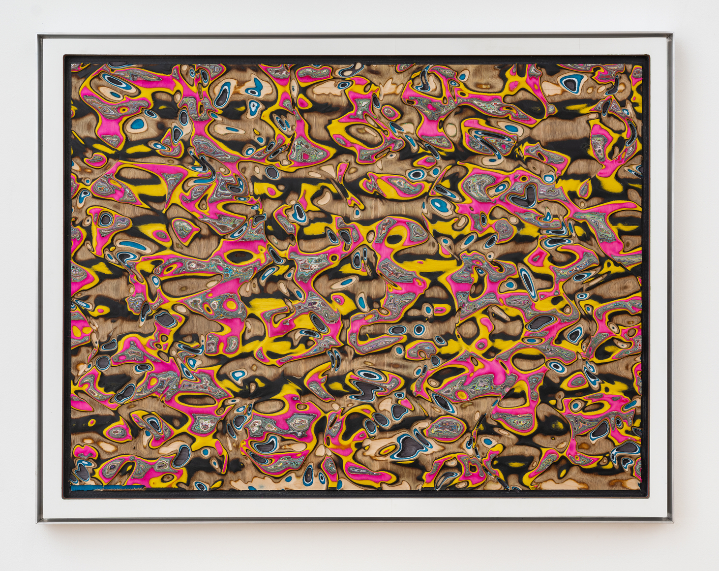 Untitled, September 2025, graffiti wall, plastic sheet, and wood veneer laminate in custom aluminum frame