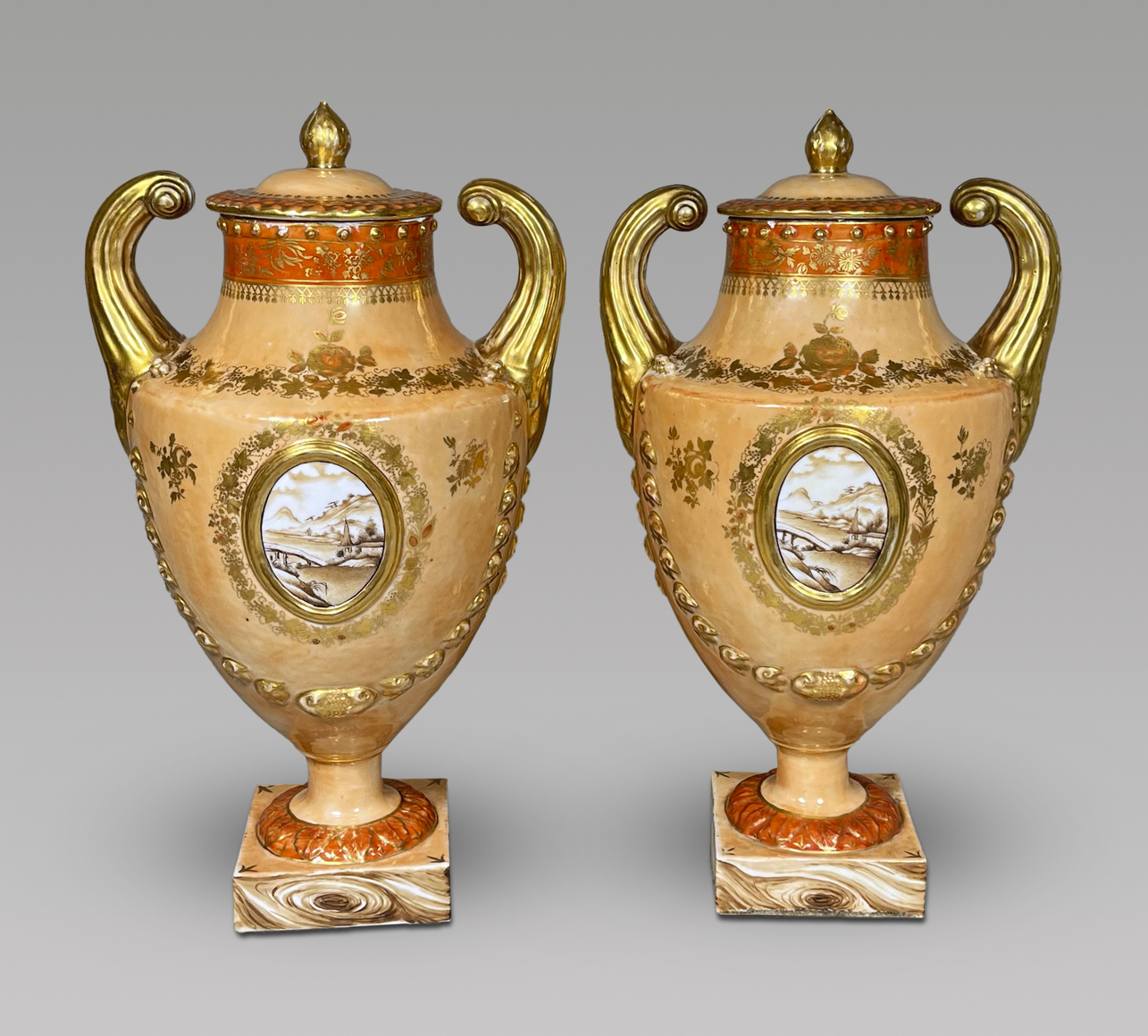 Fine Pair of Chinese Export Porcelain Peach-Toned Covered &ldquo;Pistol-Handled&rdquo; Urns