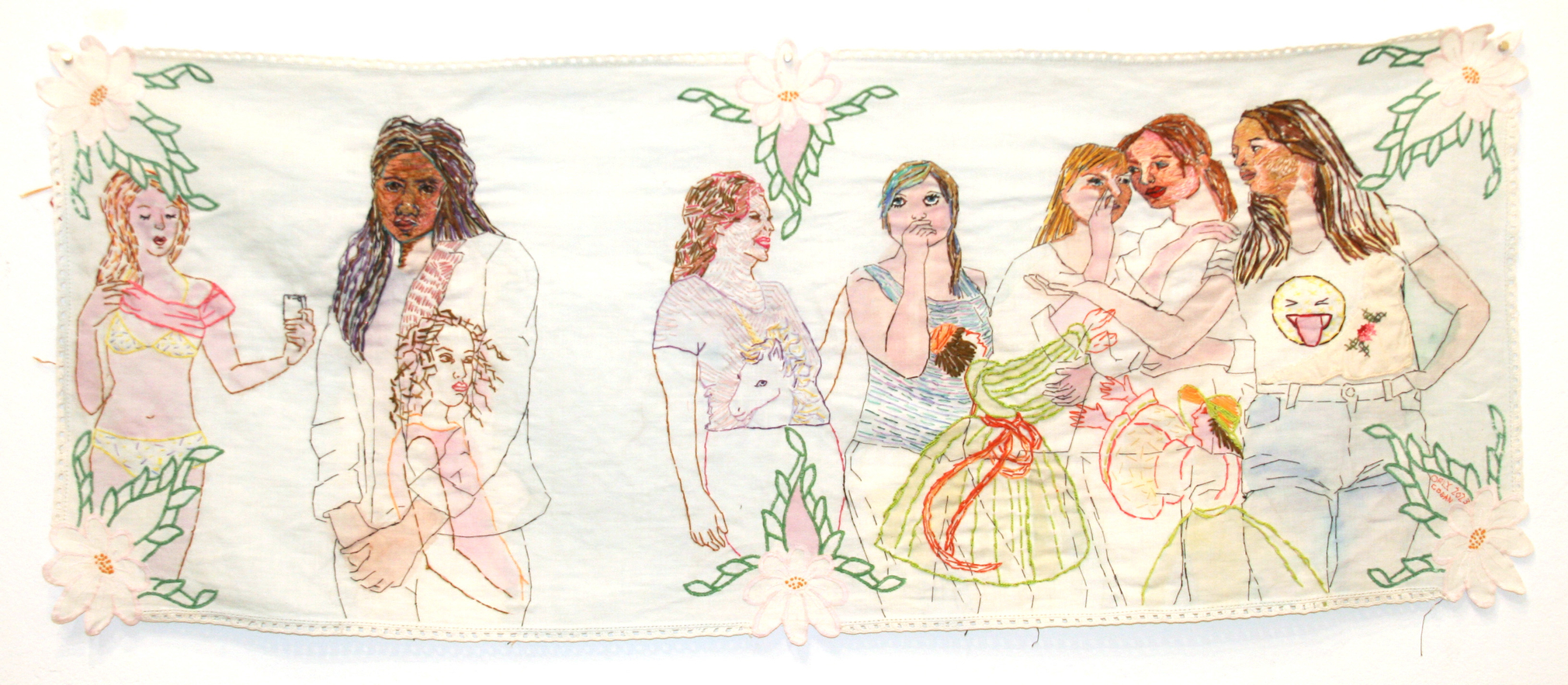 Multiple figures embroidered in a composition