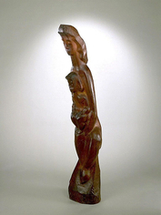Smooth wooden sculpture of a woman leaning forward. She is looking downward and holds a young child in her arms.