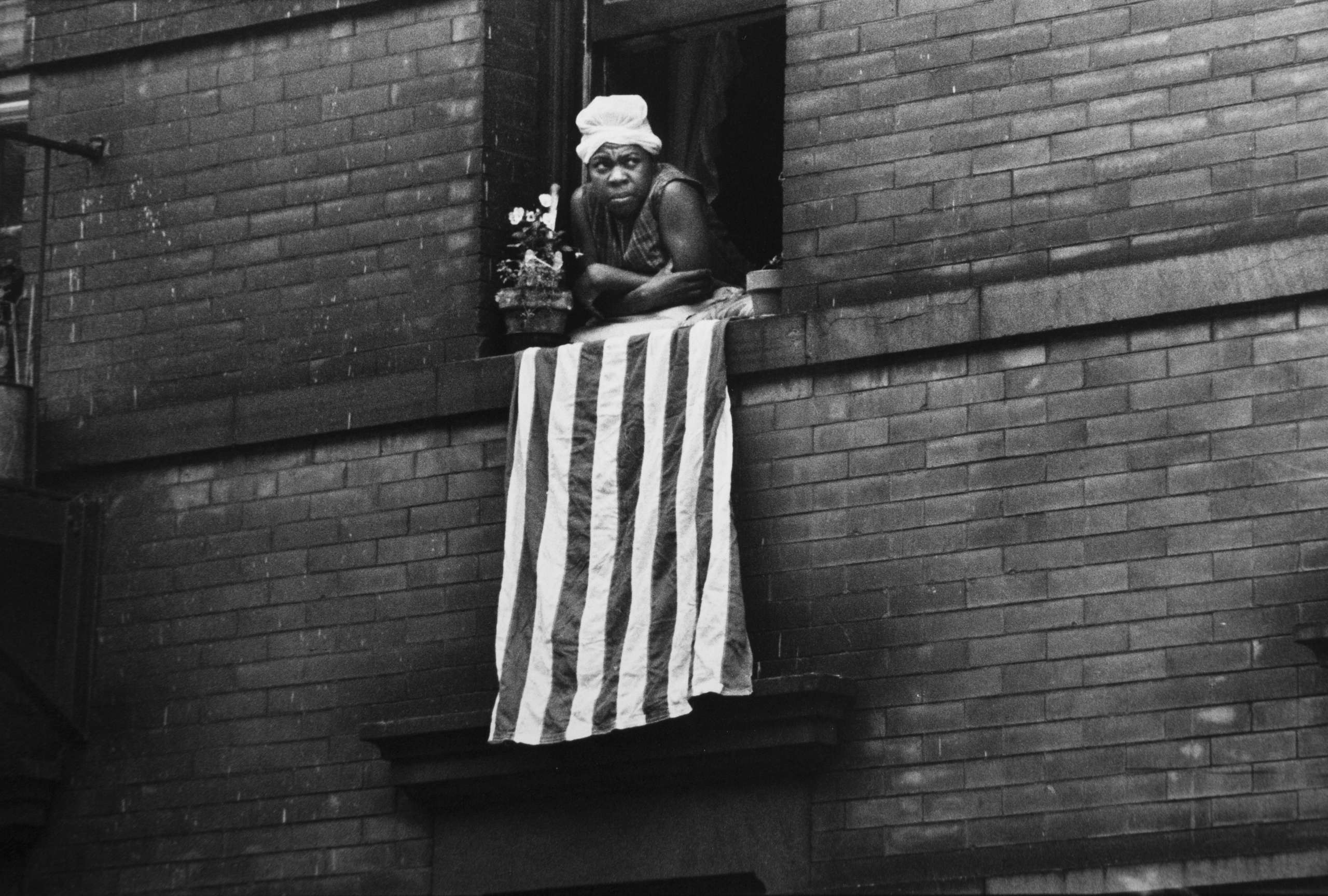 Bruce Davidson, Untitled, Time of Change (Woman at Window, New York City), 1961-1965