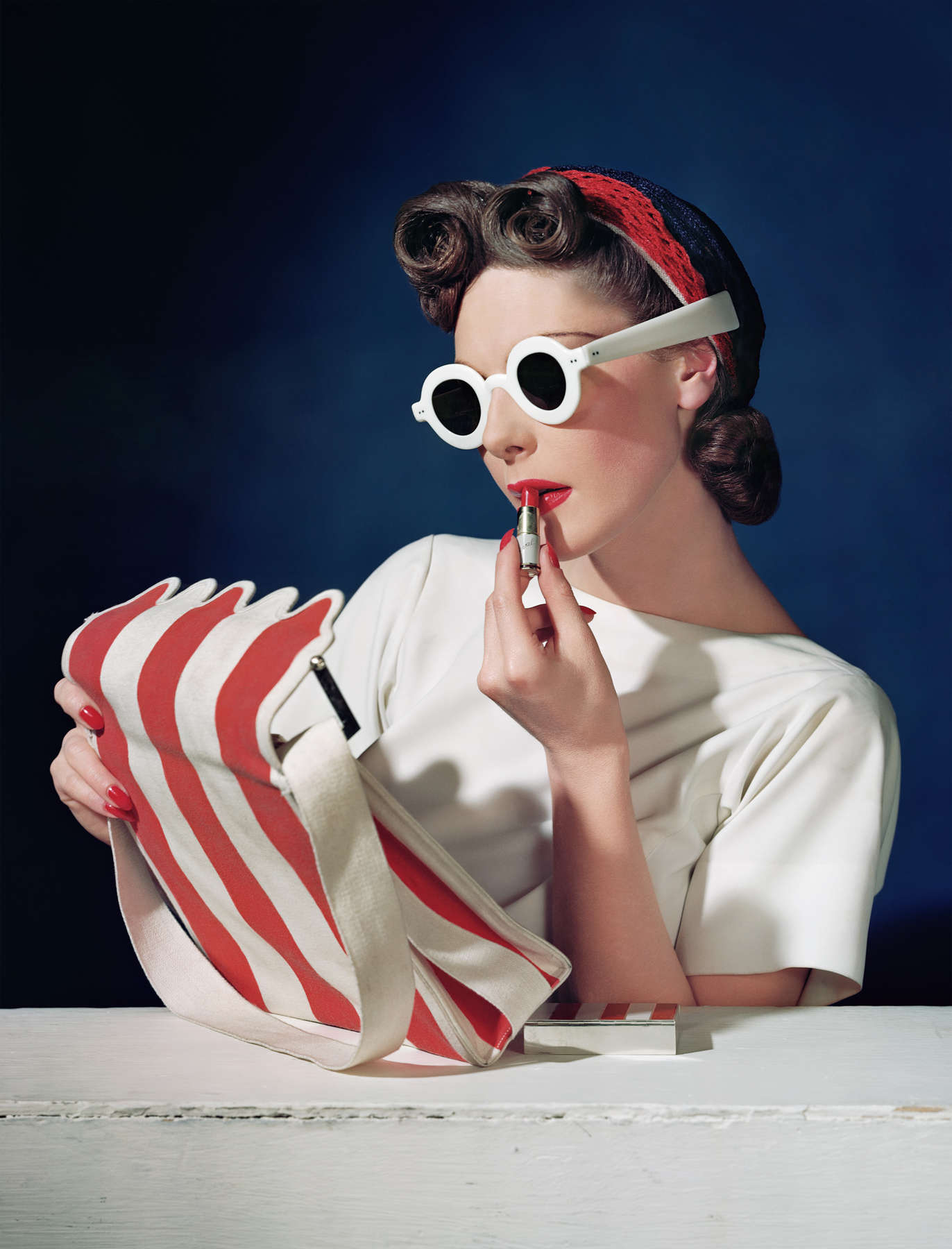Muriel Maxwell, Ensemble by Sally Victor, bag by Paul Flato, Sunglasses by Lugene
