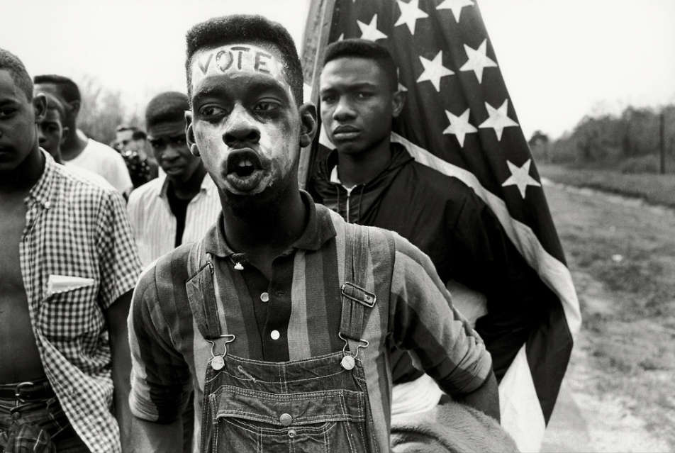 Bruce Davidson, Untitled, Time of Change (Young Man with Flag) , 1965