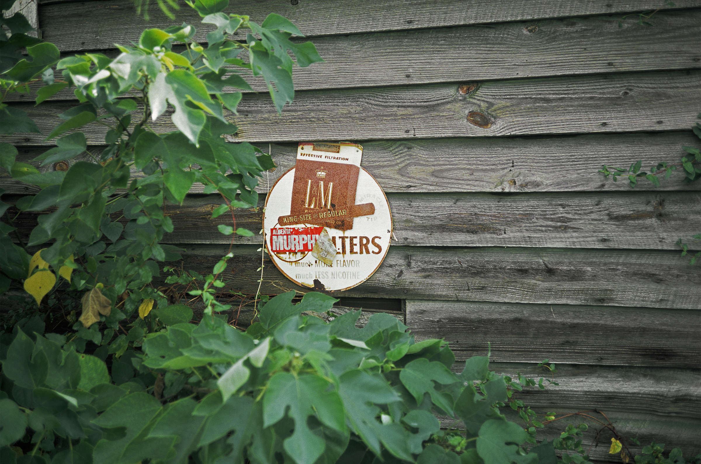 Sign on Country Store with Fallen Porch, near Cypress, Alabama