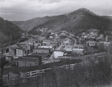 View of Welch, WV with Old and New Welch County Courthouses, US 52 and 52 Bypass, Welch, WV, 1977