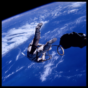 Edward White at 17,500 mph Over the Gulf of Mexico;, Photographed by James McDivitt, Gemini 4, June 3, 1965