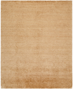 riya in the wheat colorway. a solid colored rug
