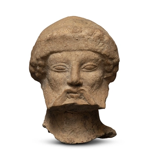 Greek head of a bearded male, South Italy, Medma, second quarter of the 5th century BC