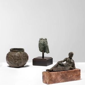 Roman vessel with three heads in relief, c.1st-2nd century AD