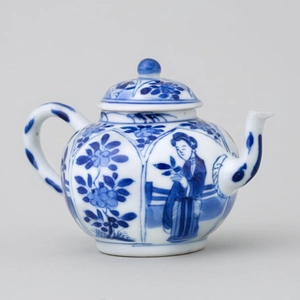 A CHINESE BLUE AND WHITE MINIATURE TEAPOT AND COVER, Kangxi (1662 - 1722)