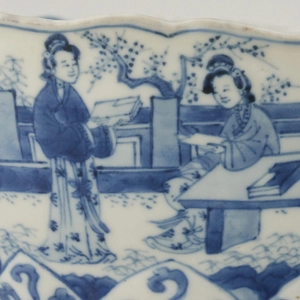 A CHINESE BLUE AND WHITE LOTUS-MOULDED BOWL, Kangxi 1662-1722