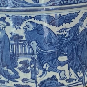 A LARGE IMPOSING CHINESE MING BLUE AND WHITE 'EIGHT IMMORTALS' TRIPOD CENSER, Wanli (1572 - 1620)