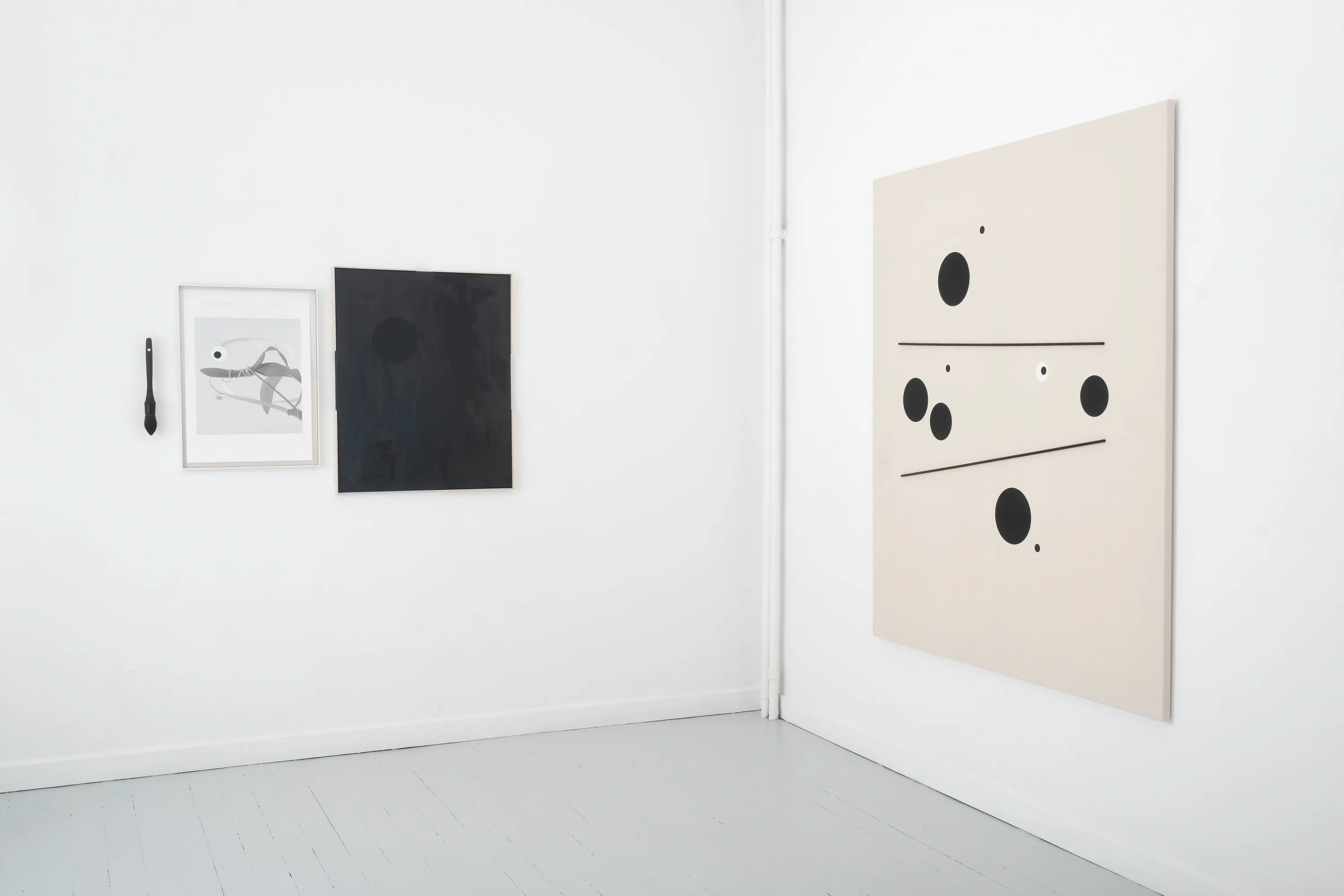 installation image of two paintings