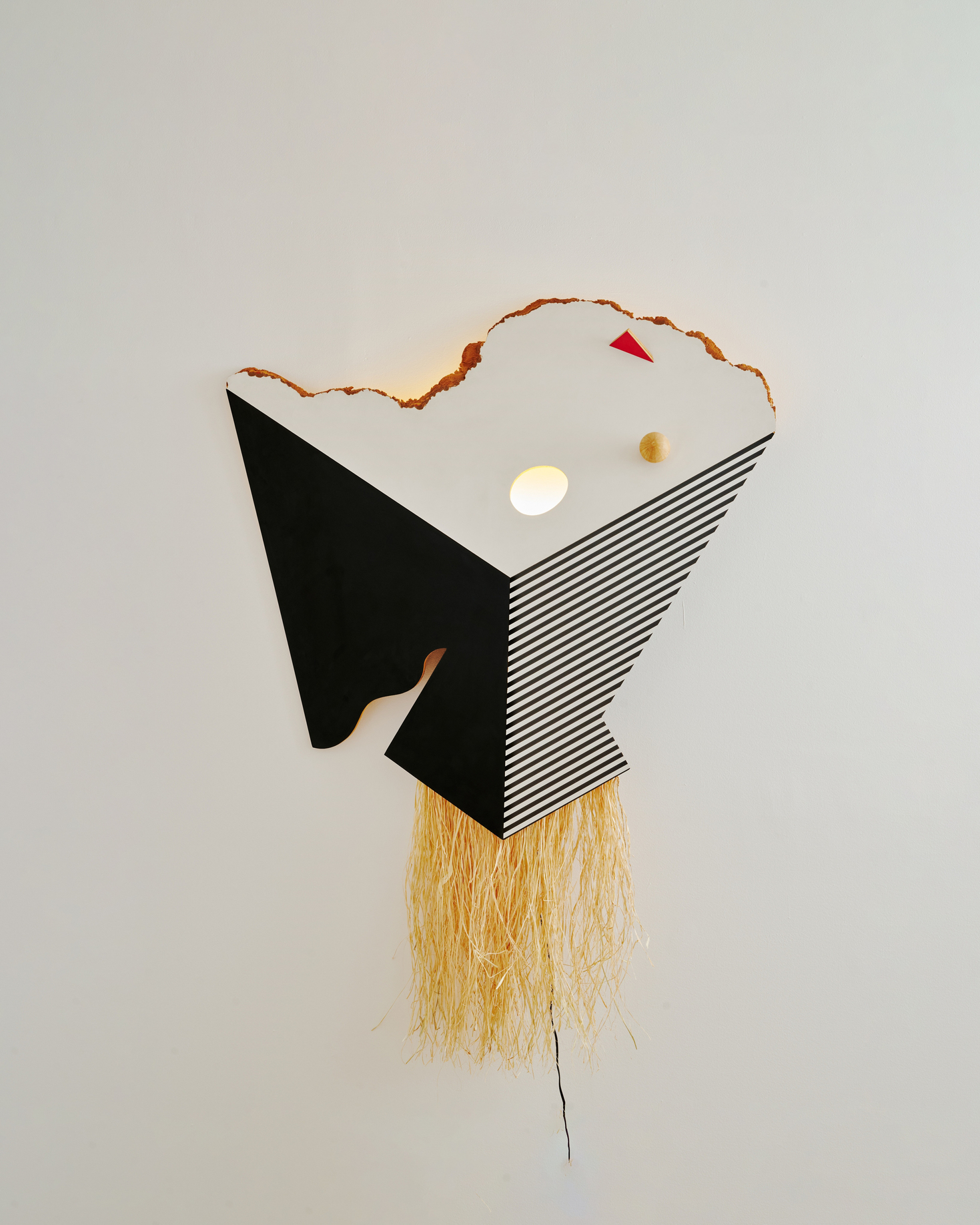 Dan Friedman,&nbsp;Cultural Geometry, 1985, Plastic laminate, OSB, raffia, lighting parts, 48 x 4 x 64 H in (121.9 x 10.2 x 162.6 cm), photography by Matthew Gordon. Courtesy of Superhouse.&nbsp;