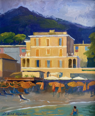 Orange and Green Stripey Umbrellas on the beach at Monterosso