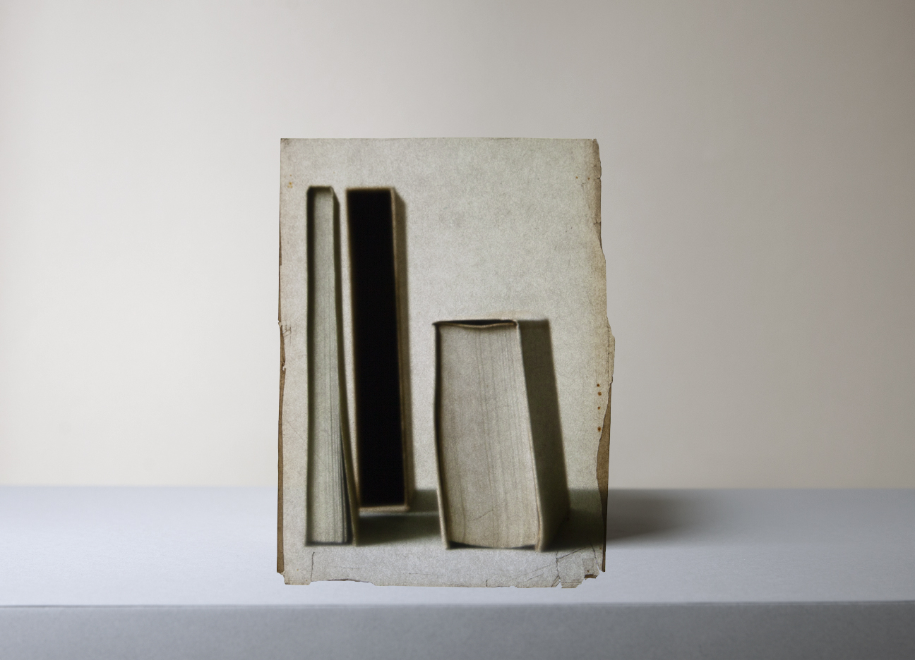Mary Ellen Bartley,&nbsp;Three Pale Books, 2022, from the series Morandi's Books. Archival pigment print, 13 x 18 inches.