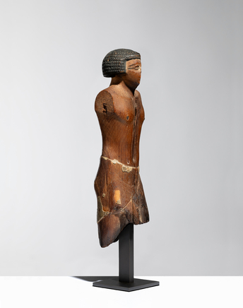 Egyptian statuette of a striding official, Middle Kingdom, 11th-early 12th Dynasty, c.2055-1911 BC