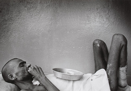 Larry Towell, Untitled [Portrait of a man lying in bed], circa 1981