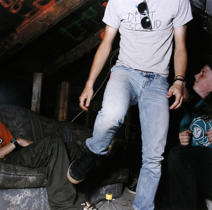 Jaret Belliveau, Untitled [dancing in attic, "dirt squad" t-shirt], 2005