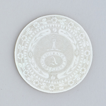 CHINESE MOTHER OF PEARL ARMORIAL COUNTER, 19th century