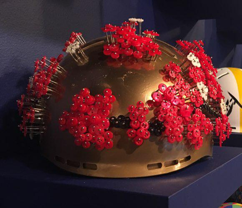 Passion Flower PC, 2018, Buttons and pins on gold painted helmet