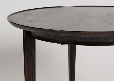 round ebonized oak coffee table