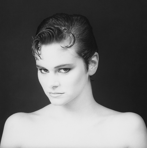 Black and white Mapplethorpe portrait of woman with short hair