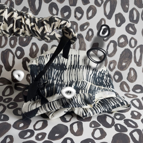 Michelle Forsyth Black and white glove with floating rings, 2022 archival inkjet print 36 x 36 in. 91.4 x 91.4 cm Edition of 5