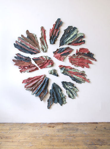 Spreading and Tearing Away From Center, 135 lbs, 2018. Pigmented stoneware and hardware.