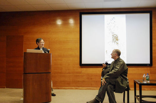 Arnold Chang and Michael Cherney in conversation during a lecture