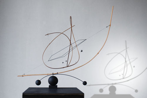 Laurent Martin “Lo”, Space Ship, 2020, Taiwan smoked bamboo, Titan braid thread, leads and brass on steel base, 58 x 66 x 32 cm, Rotation diameter: 76 cm.